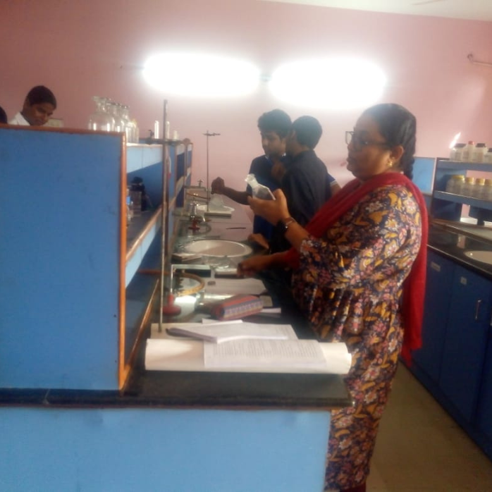 Students working at science laboratory workstations during a practical session at Darsh Universal School